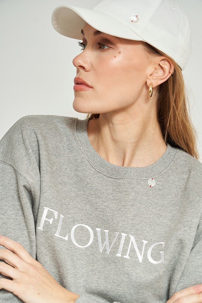 
                      
                        FLOWING SWEATSHIRT
                      
                    