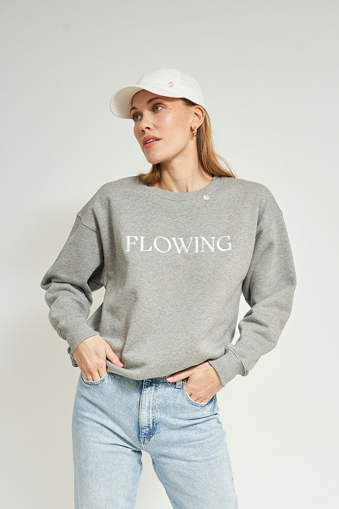 
                      
                        FLOWING SWEATSHIRT
                      
                    