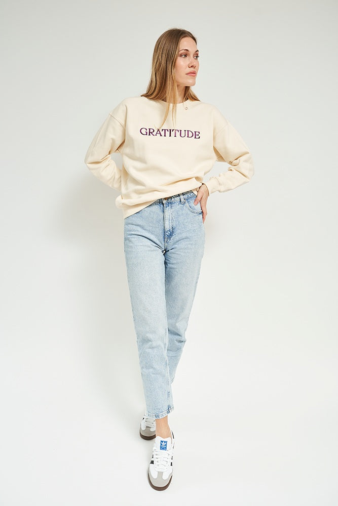 
                      
                        GRATITUDE SWEATER
                      
                    